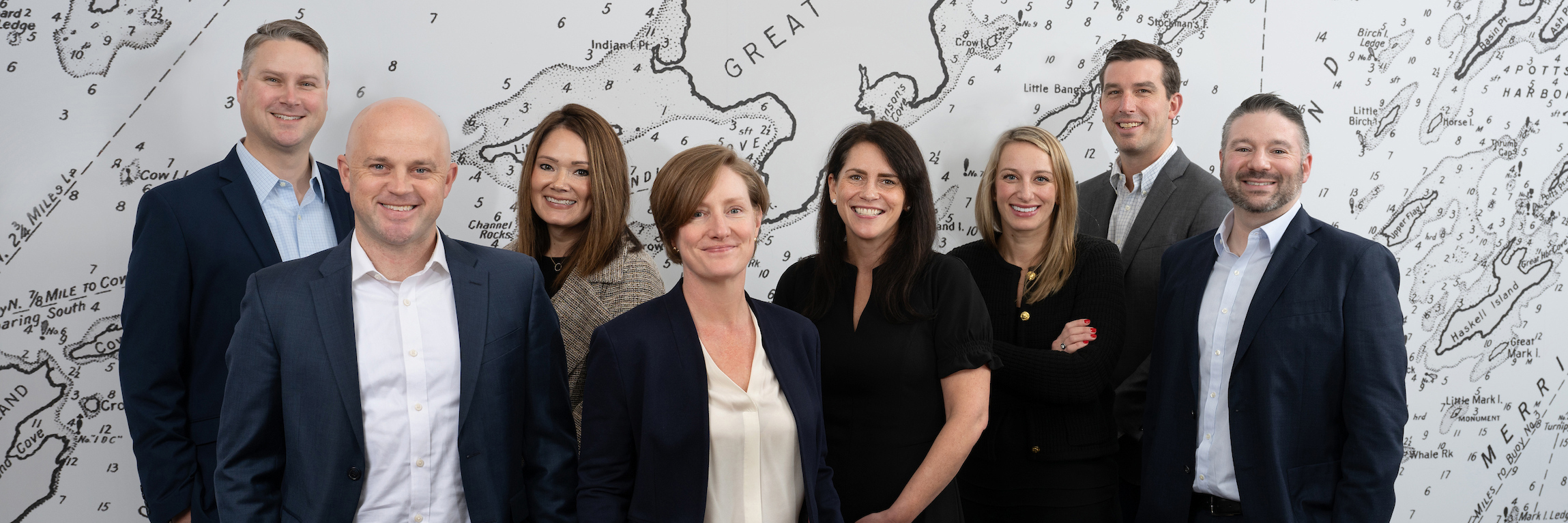 The younger Spinnaker Trust team members in their office